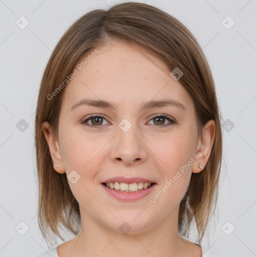 Joyful white young-adult female with medium  brown hair and brown eyes