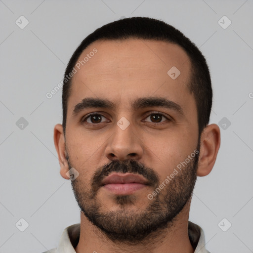 Neutral latino young-adult male with short  black hair and brown eyes