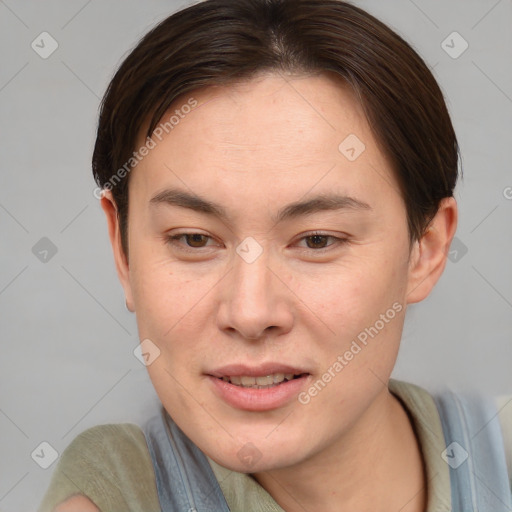 Joyful asian young-adult female with short  brown hair and brown eyes