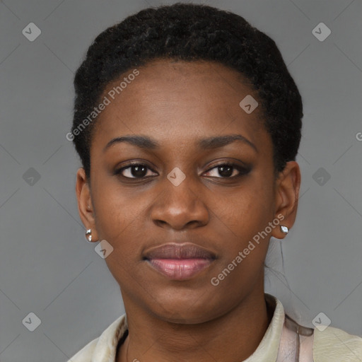 Joyful black young-adult female with short  black hair and brown eyes