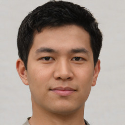 Neutral asian young-adult male with short  brown hair and brown eyes