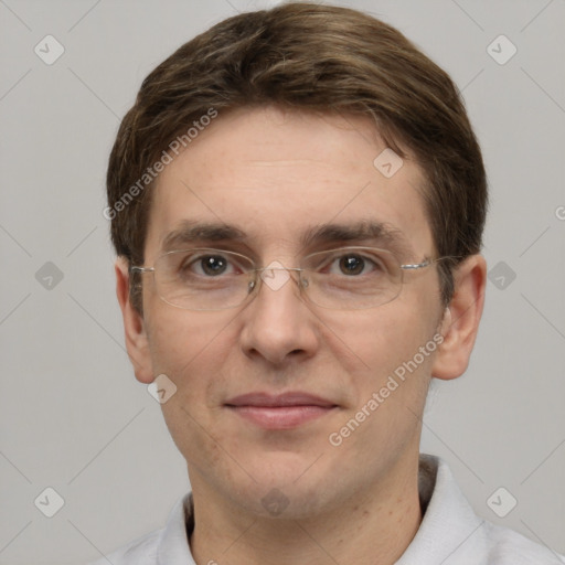 Joyful white adult male with short  brown hair and grey eyes