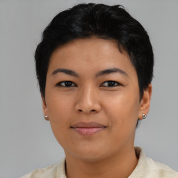 Joyful asian young-adult female with short  black hair and brown eyes