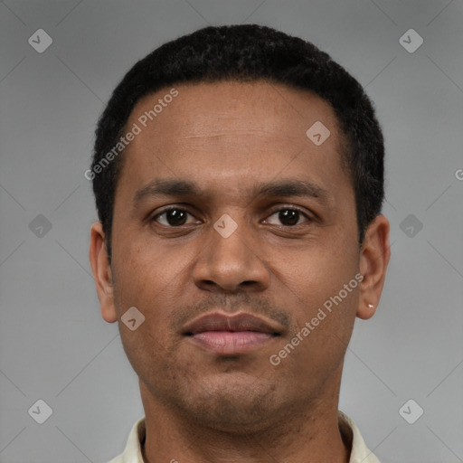 Neutral latino young-adult male with short  black hair and brown eyes