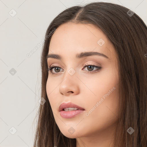 Neutral white young-adult female with long  brown hair and brown eyes