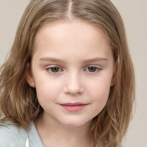 Joyful white child female with long  brown hair and brown eyes