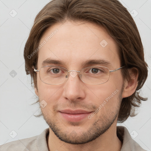 Joyful white adult male with short  brown hair and grey eyes