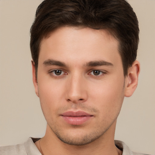 Neutral white young-adult male with short  brown hair and brown eyes