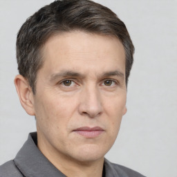 Neutral white adult male with short  brown hair and brown eyes