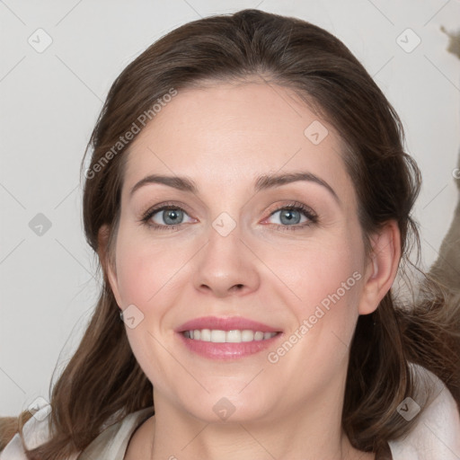 Joyful white young-adult female with medium  brown hair and grey eyes