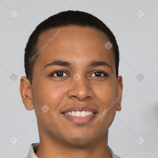 Joyful latino young-adult male with short  brown hair and brown eyes