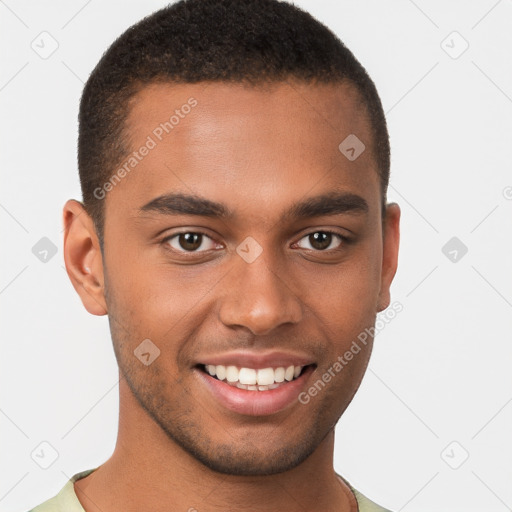 Joyful black young-adult male with short  brown hair and brown eyes