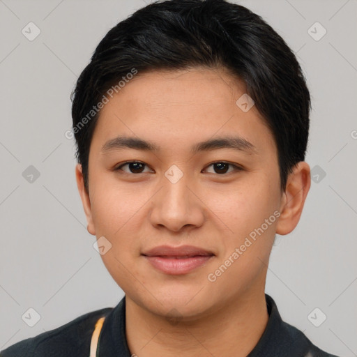 Joyful asian young-adult male with short  black hair and brown eyes