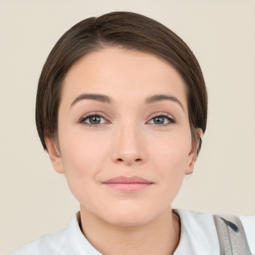 Neutral white young-adult female with short  brown hair and brown eyes