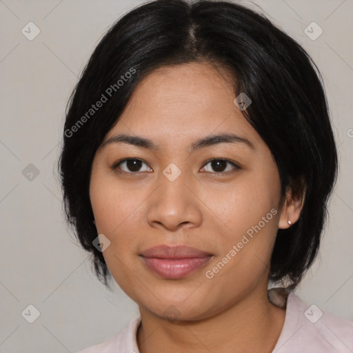 Joyful asian young-adult female with medium  black hair and brown eyes