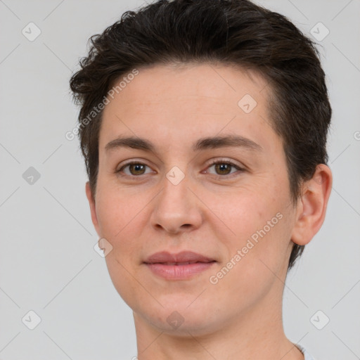 Joyful white young-adult female with short  brown hair and brown eyes