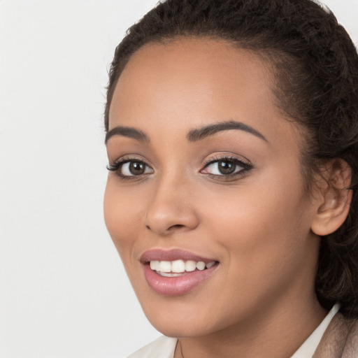 Joyful white young-adult female with long  brown hair and brown eyes