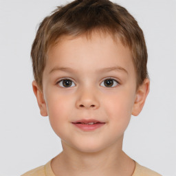 Joyful white child male with short  brown hair and brown eyes