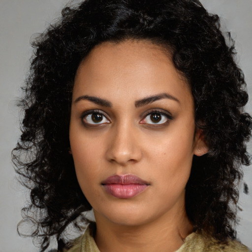 Neutral latino young-adult female with medium  black hair and brown eyes