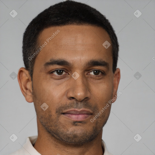 Neutral latino young-adult male with short  brown hair and brown eyes