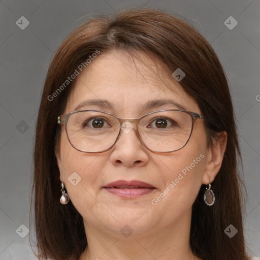 Joyful white adult female with medium  brown hair and brown eyes