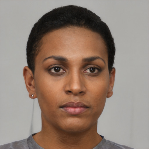 Neutral black young-adult female with short  brown hair and brown eyes