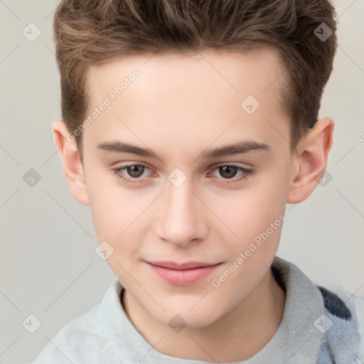 Joyful white child male with short  brown hair and brown eyes