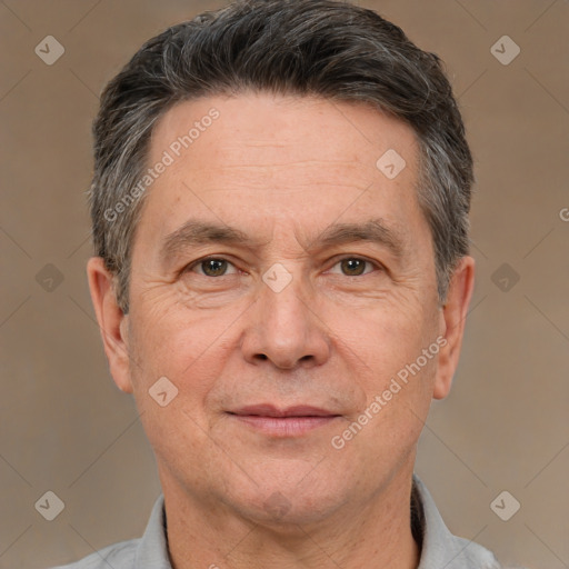 Joyful white middle-aged male with short  brown hair and brown eyes