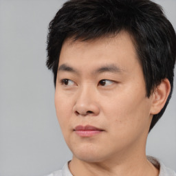 Neutral asian young-adult male with short  black hair and brown eyes
