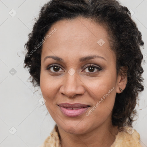 Joyful latino adult female with medium  brown hair and brown eyes