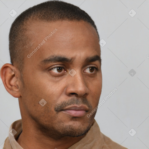 Neutral latino young-adult male with short  brown hair and brown eyes