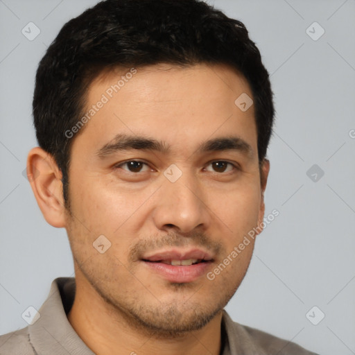 Joyful latino young-adult male with short  brown hair and brown eyes