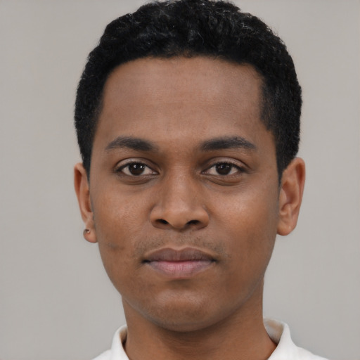 Neutral black young-adult male with short  black hair and brown eyes