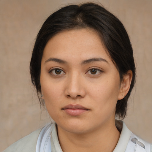 Neutral asian young-adult female with medium  brown hair and brown eyes
