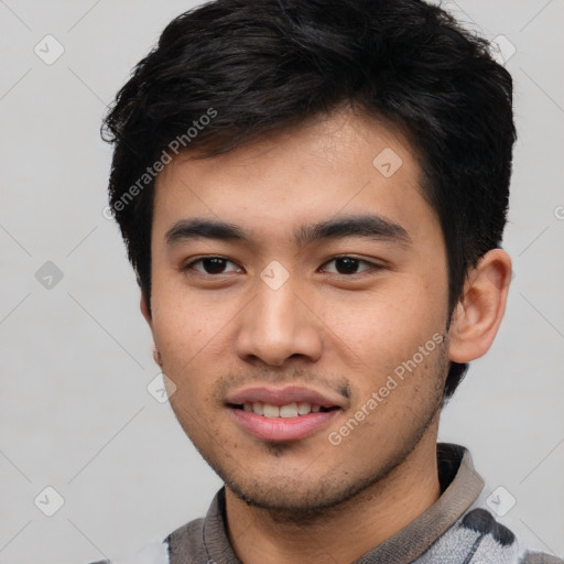 Joyful asian young-adult male with short  black hair and brown eyes