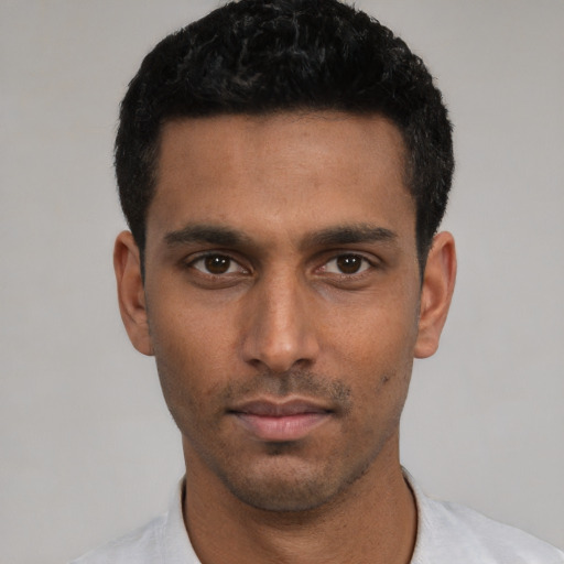 Neutral white young-adult male with short  black hair and brown eyes