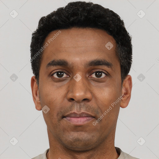 Neutral latino young-adult male with short  black hair and brown eyes