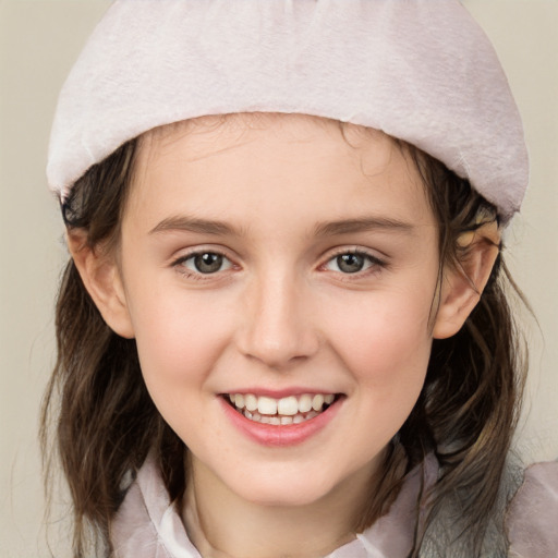 Joyful white child female with medium  brown hair and grey eyes