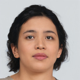 Neutral asian young-adult female with medium  brown hair and brown eyes