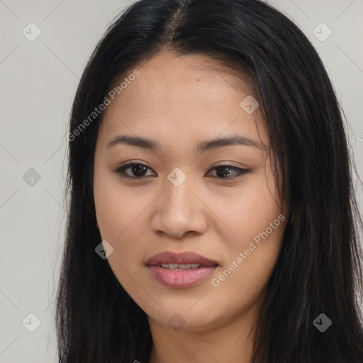 Joyful latino young-adult female with long  brown hair and brown eyes