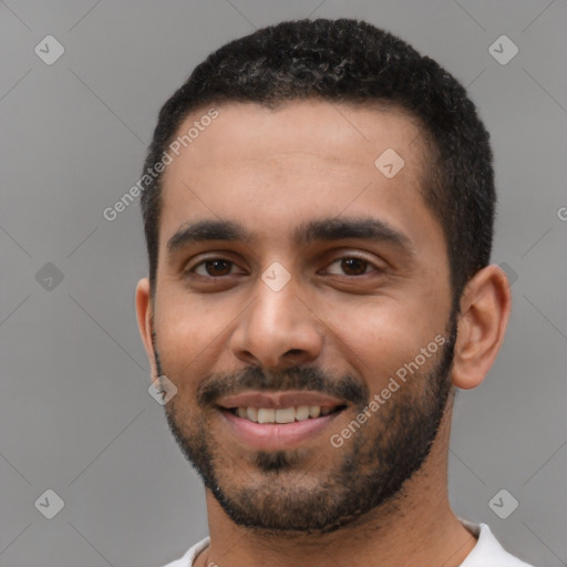 Joyful latino young-adult male with short  black hair and brown eyes