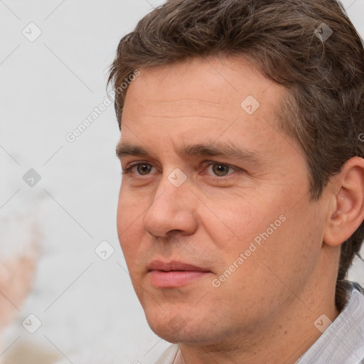 Neutral white adult male with short  brown hair and brown eyes