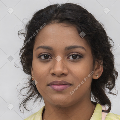 Joyful black young-adult female with long  brown hair and brown eyes