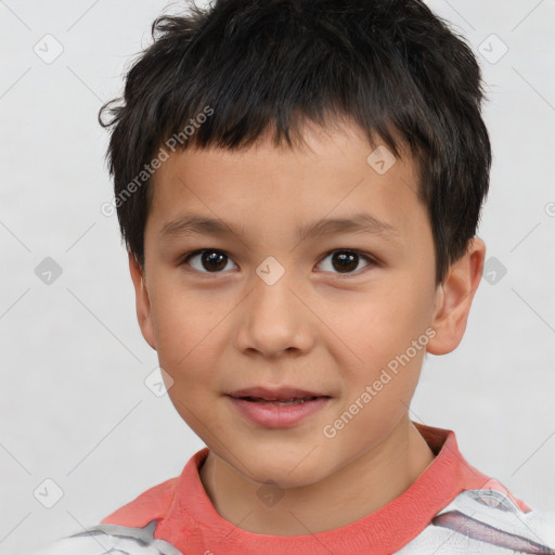 Joyful white child male with short  brown hair and brown eyes