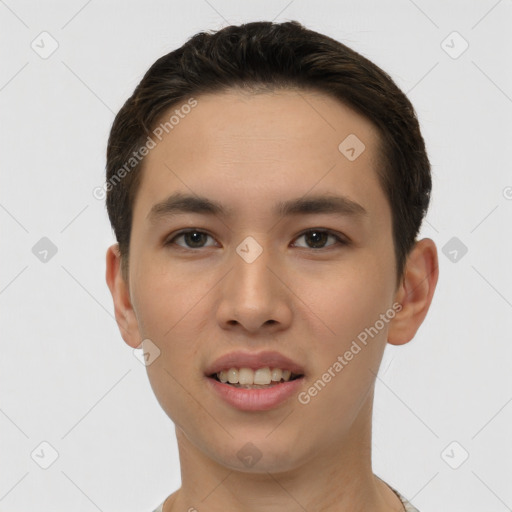 Joyful asian young-adult male with short  brown hair and brown eyes