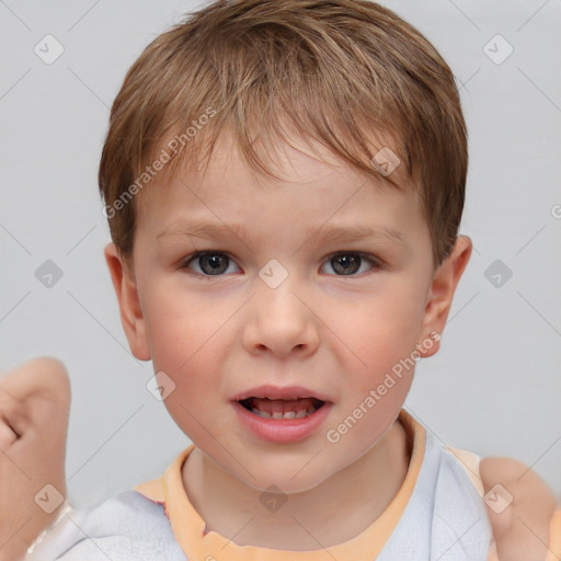 Joyful white child male with short  brown hair and brown eyes