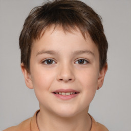 Joyful white child male with short  brown hair and brown eyes