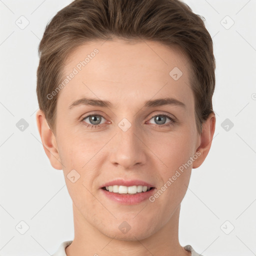 Joyful white young-adult female with short  brown hair and grey eyes