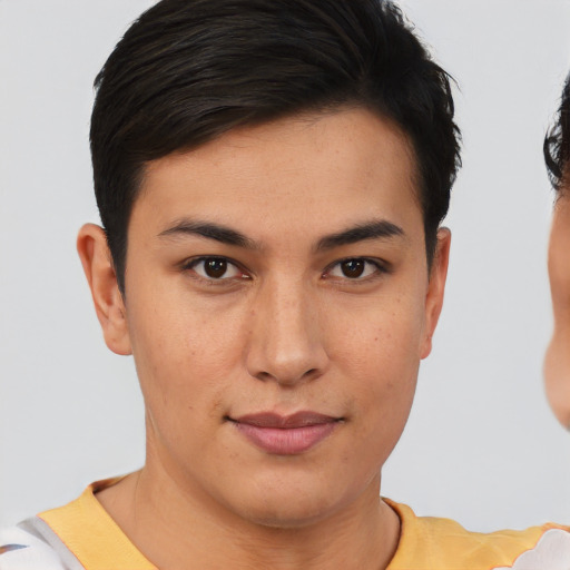 Joyful asian young-adult female with short  brown hair and brown eyes