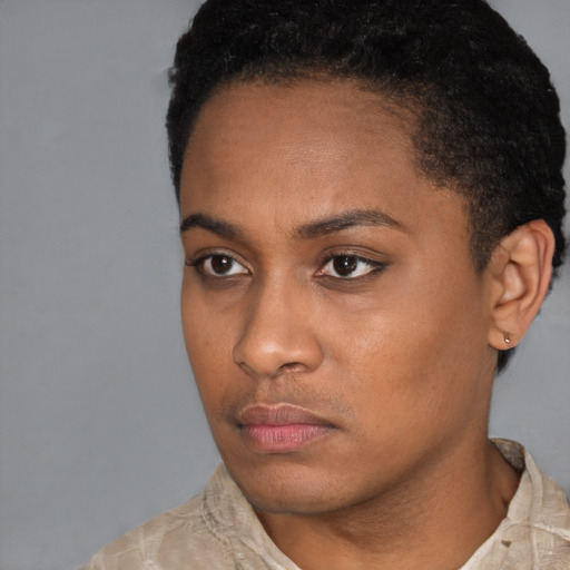 Neutral latino young-adult female with short  black hair and brown eyes